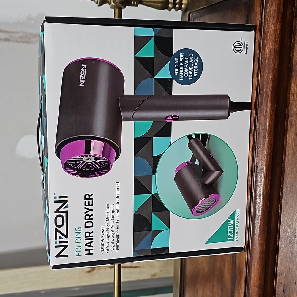 Nizoni Folding Hair Dryer Brand New In Box. 1200W Power 3 settings High/Medium/L